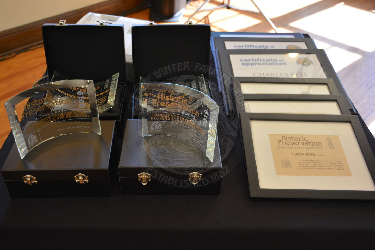 Historic Preservation awards displayed on table