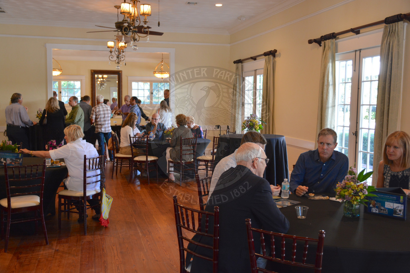 Attendees of event seated at round tables