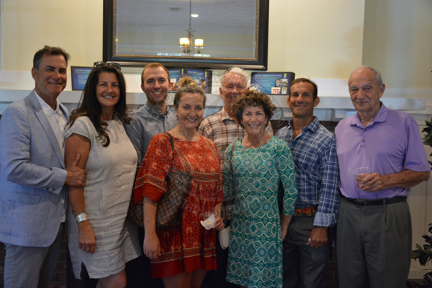Group photo of 8 people standing