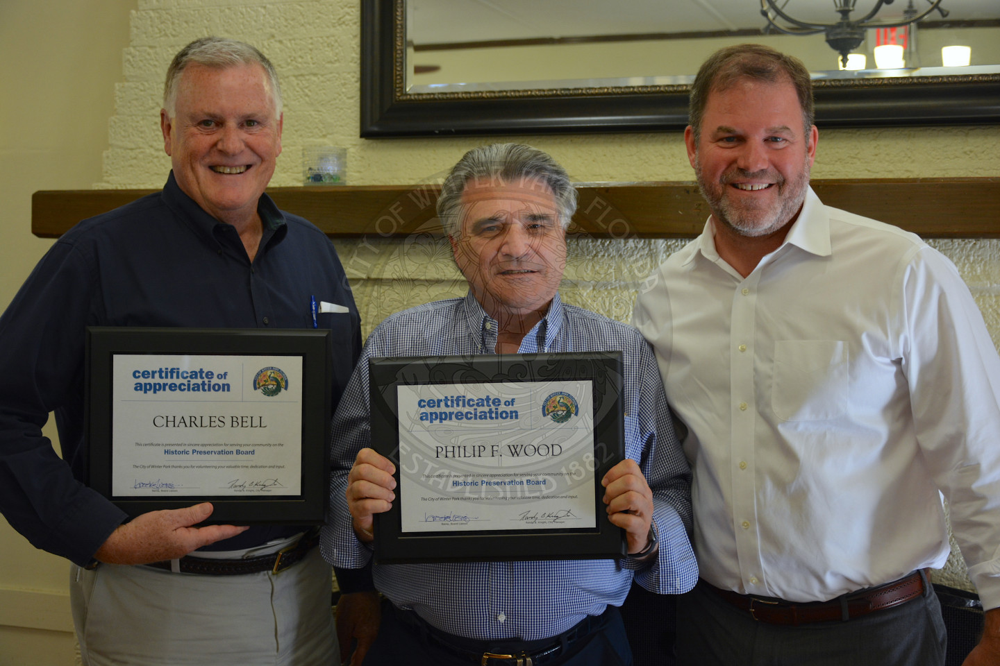 Mayor Steve Leary poses with two gentlemen that received an award