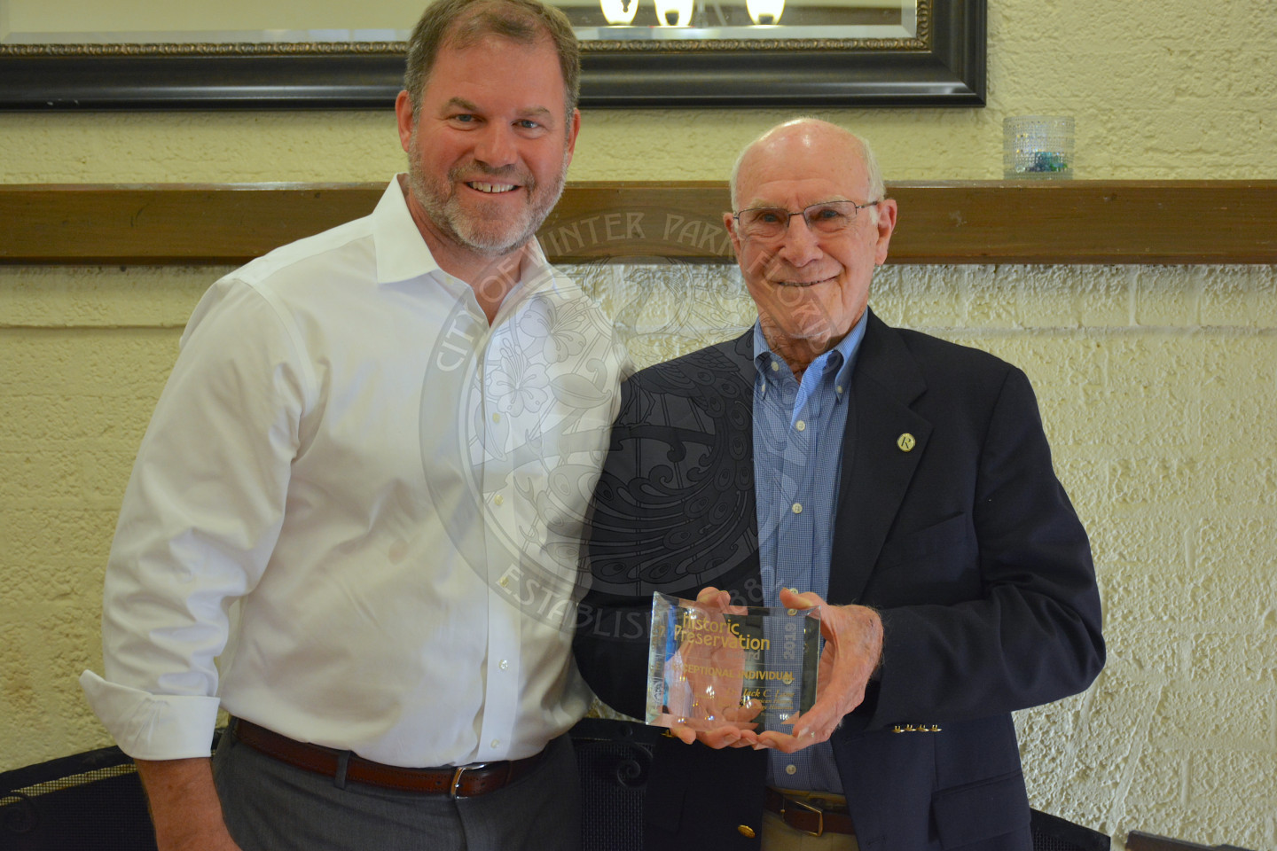 Mayor Steve Leary poses with award recipient, male