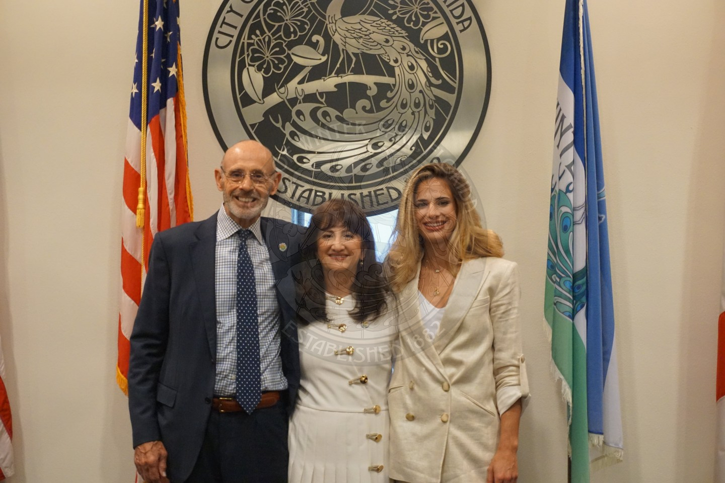 A group photo of Mayor DeCiccio with her husband and daughter.