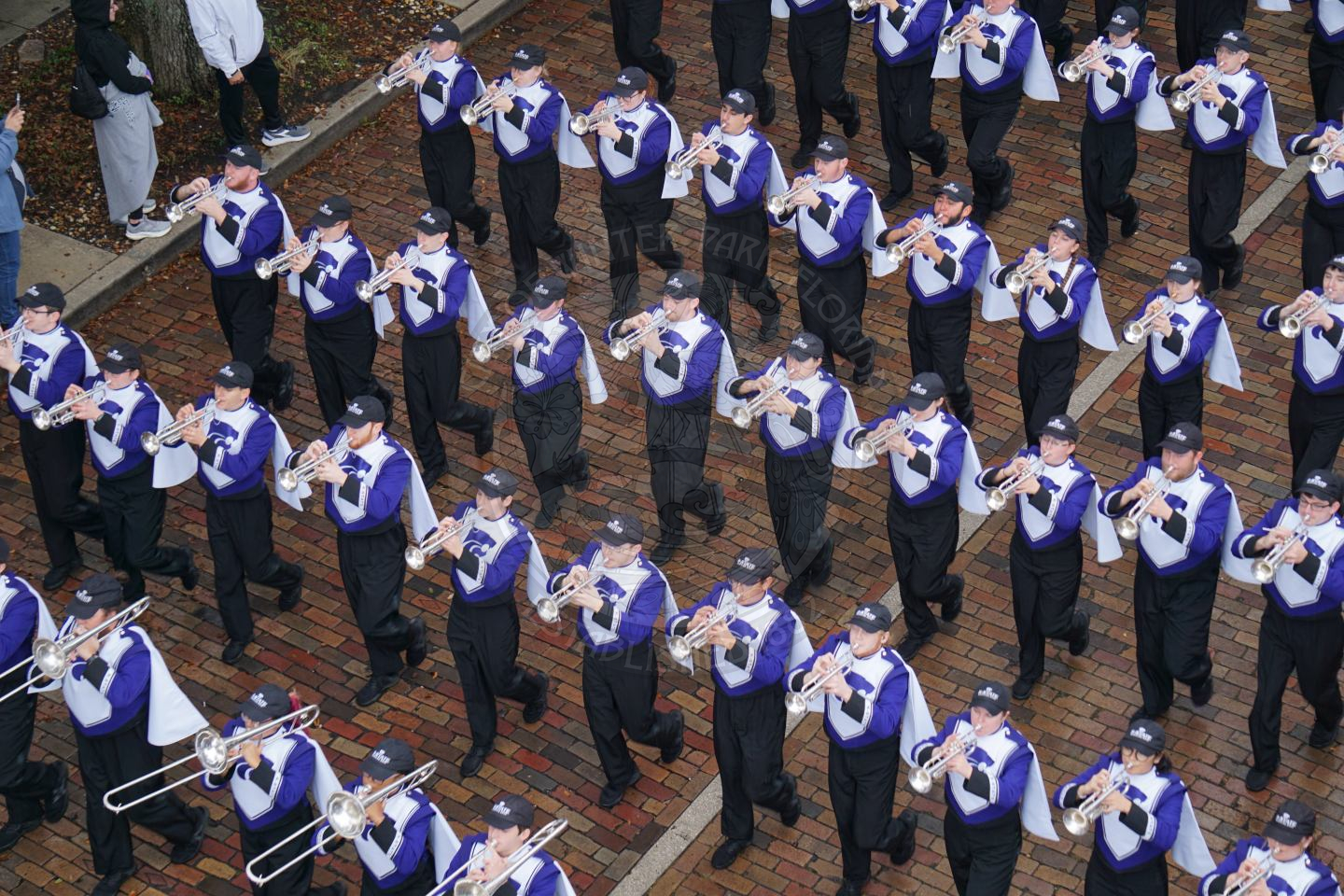 Ariel view of Kansas State band marching down Park avenue.