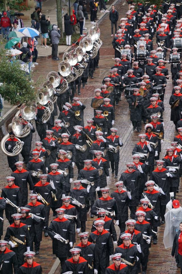 Ariel view of North Carolina State playing thier instruments marching down Park Avenue.