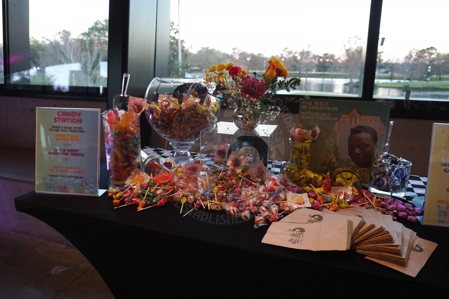 the candy station with a table full of candy for the seniors to get their dessert for the night.