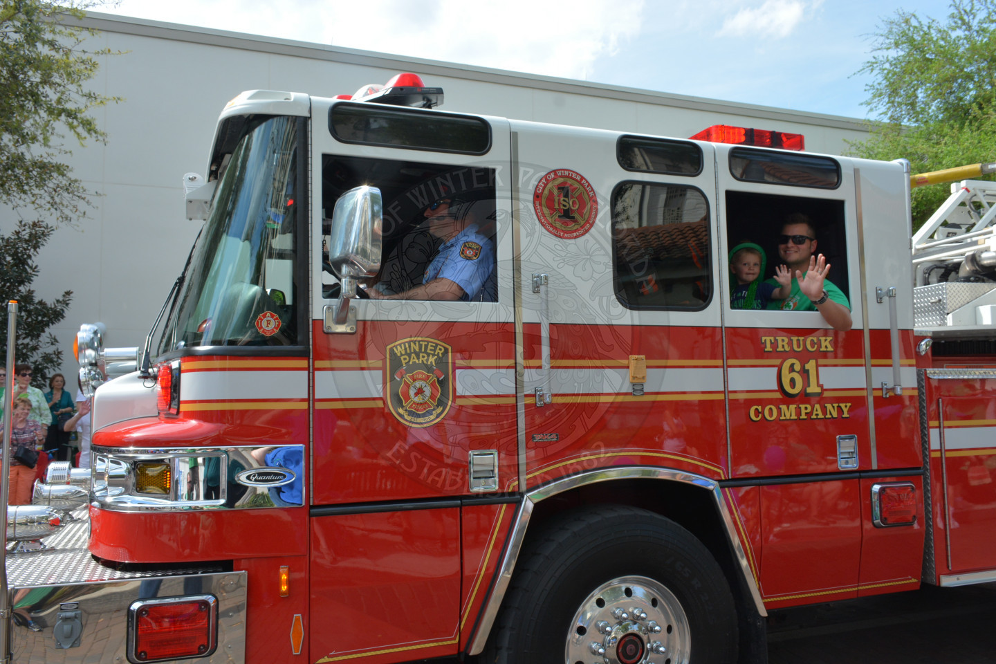 Winter Park Fire-Rescue Truck with people waving