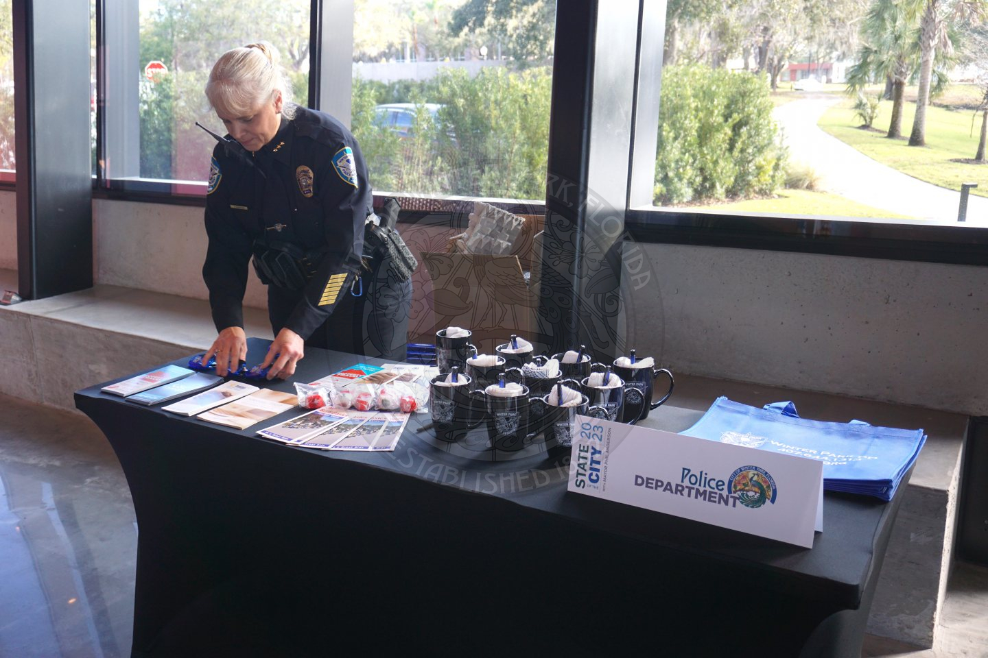Deputy Chief putting together a table for the Police Department