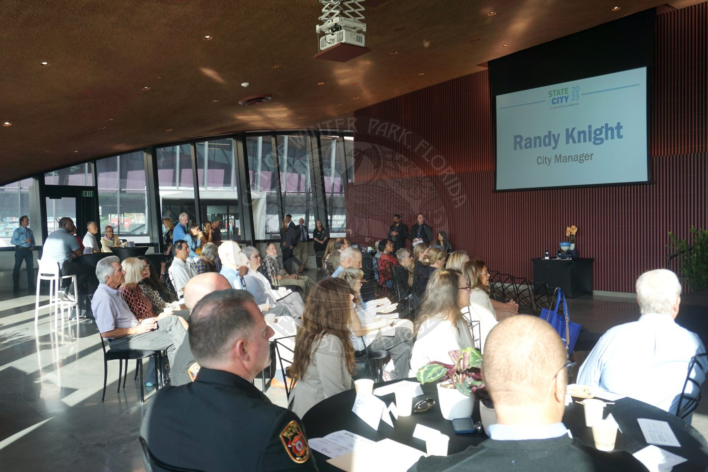 picture of the audience sitting listening to the city manager talk