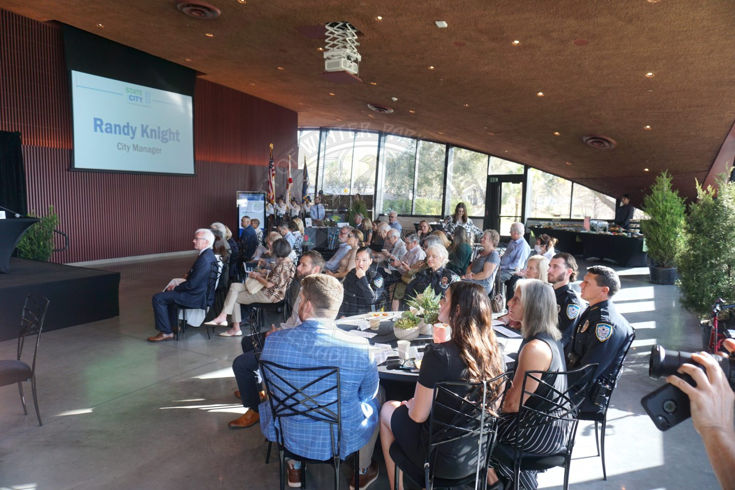 picture of the audience sitting listening to the city manager talk
