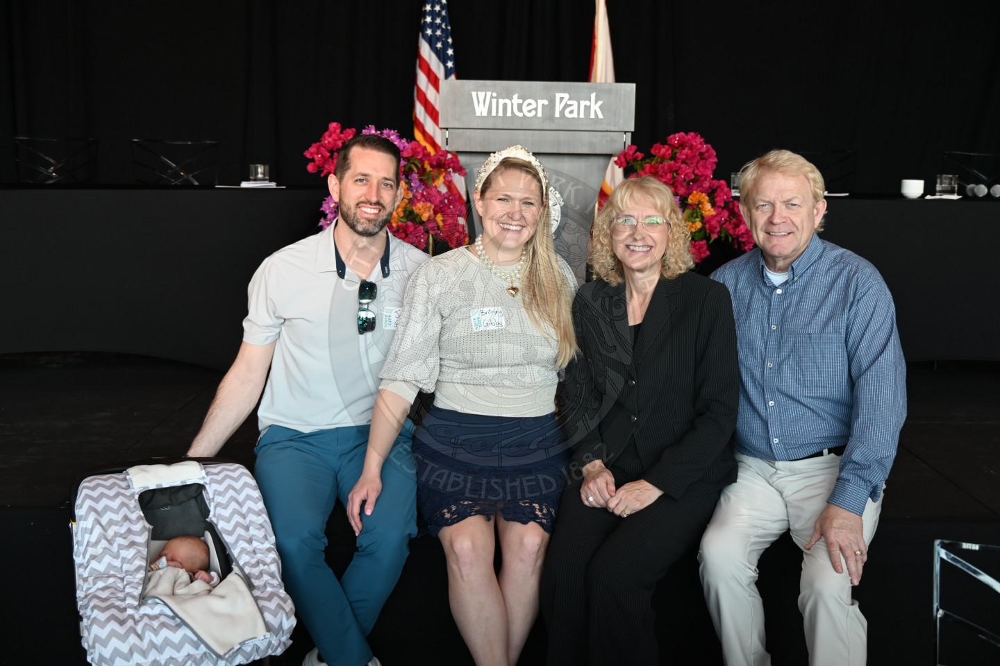 City Employee of the year posing with her family.