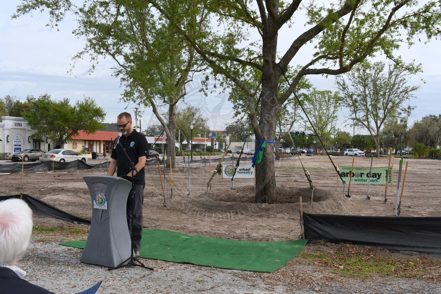 Winter Park Employee standing behind podium talking