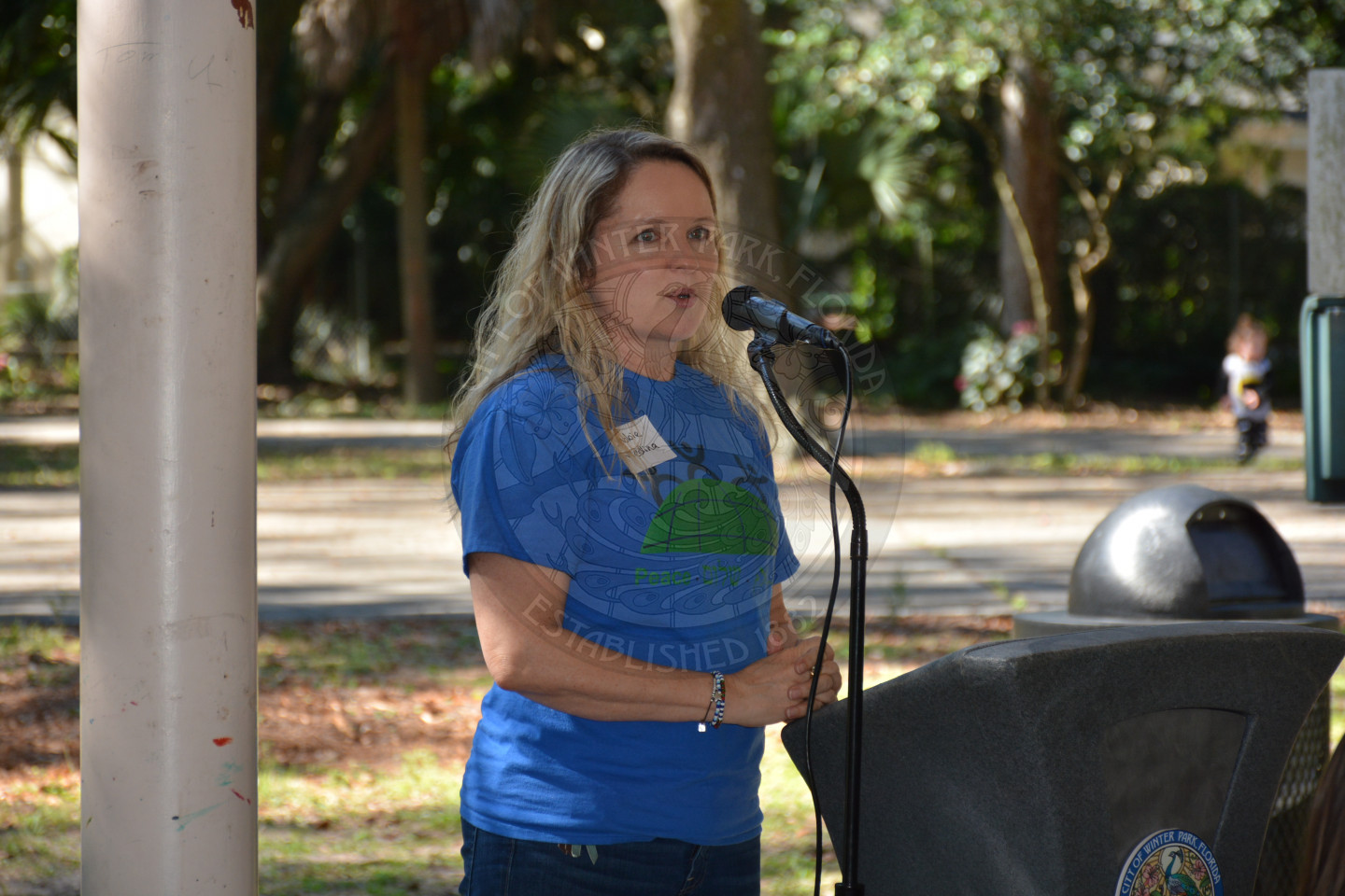 close up of female at the podium sharing remarks