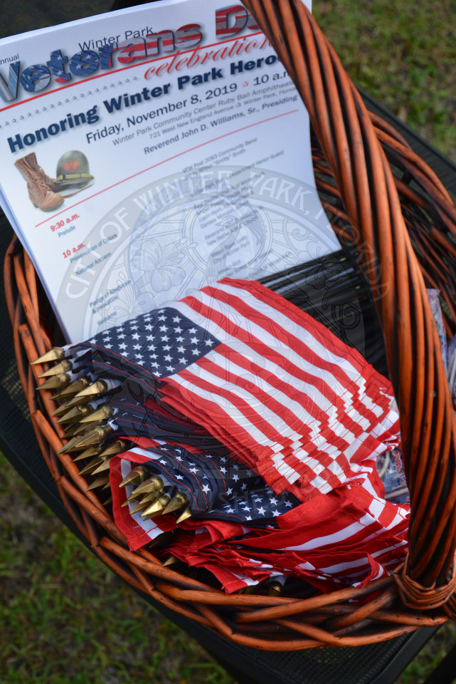 basket with american flags and veterans day programs