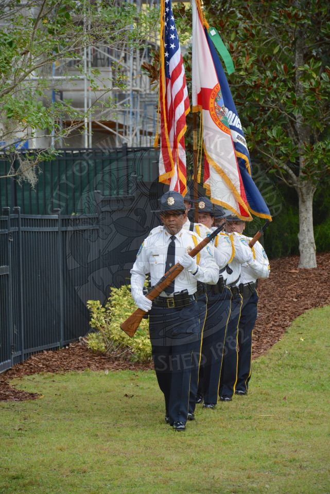 police officers marching in the presentation of colors