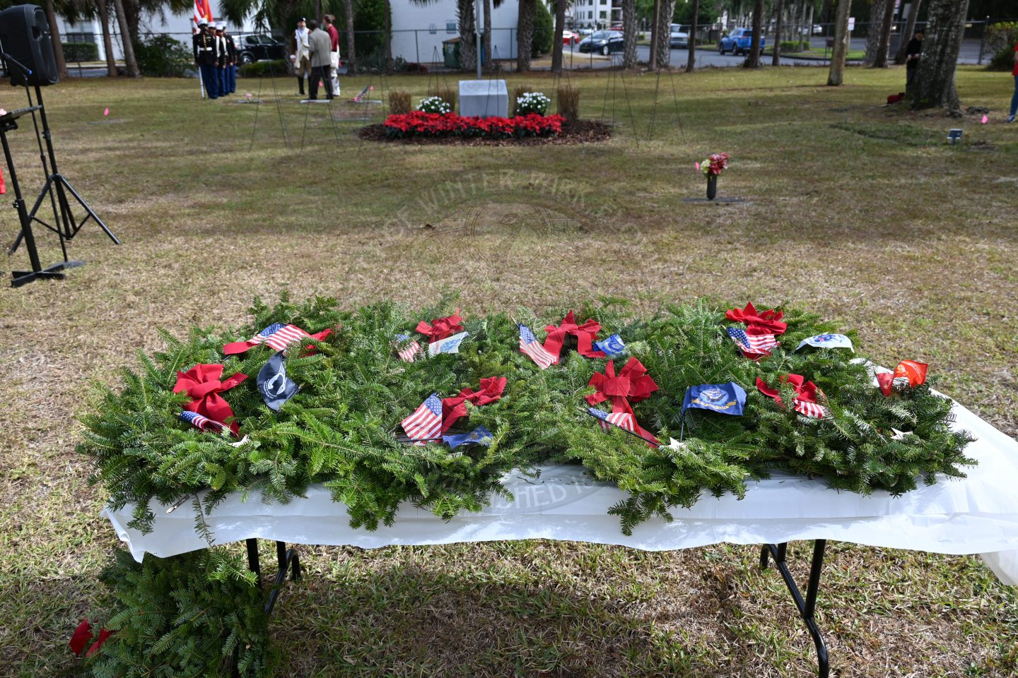 wreaths for every military branch sitting on a table.