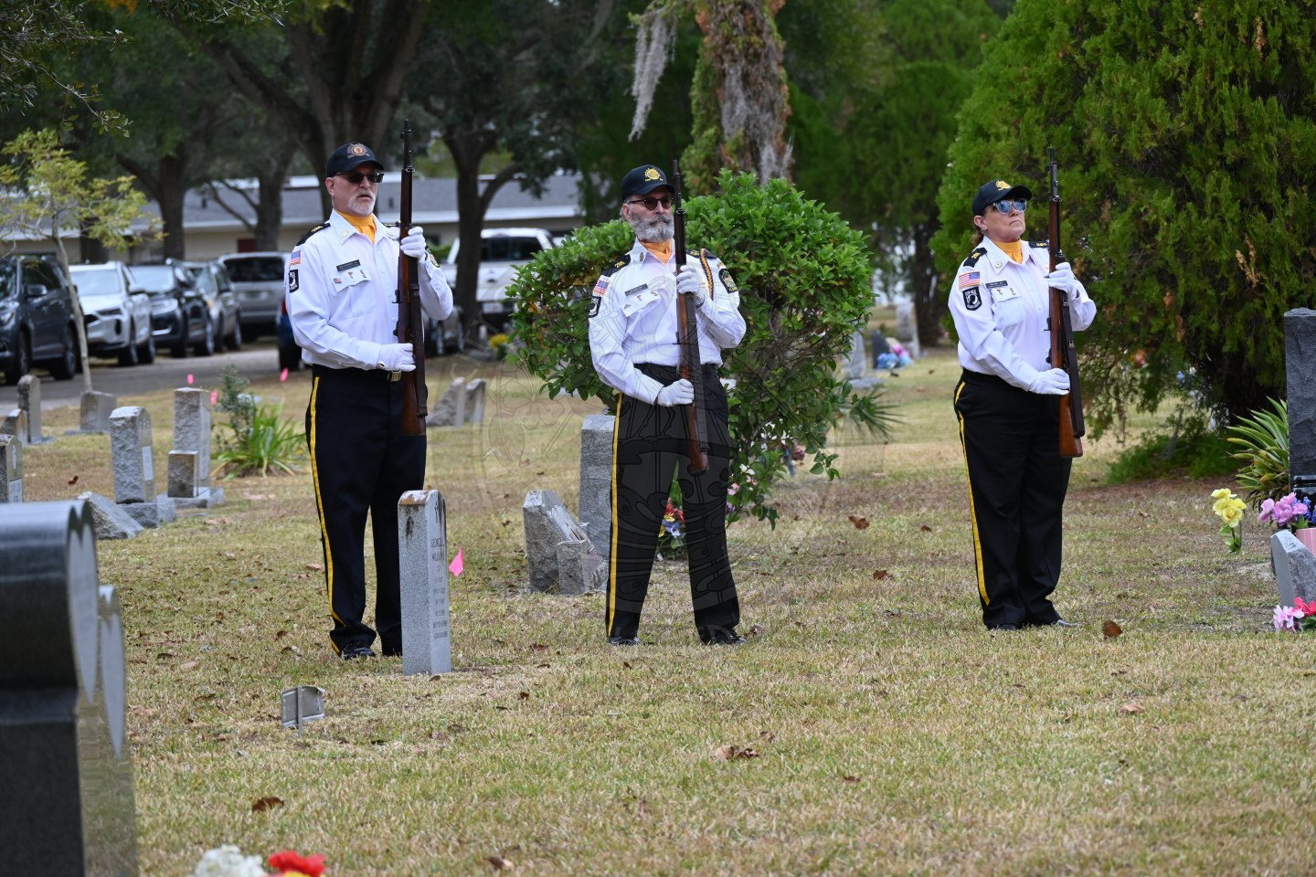 uniformed military essential holding guns.