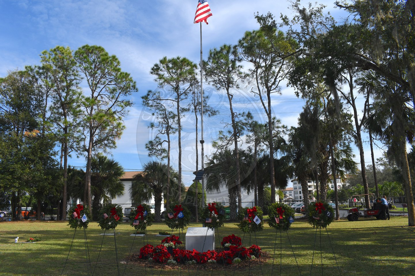 wreaths in front of flag pole at Pineywood Cemetary
