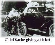 Chief Sache giving a ticket