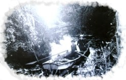 Old photograph of a boat in one of the Winter Park canals