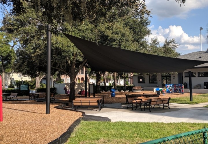 Azalea Lane Playground picnic area under shade structure