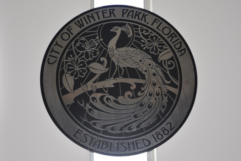 Seal of the City of Winter Park hung on a wall