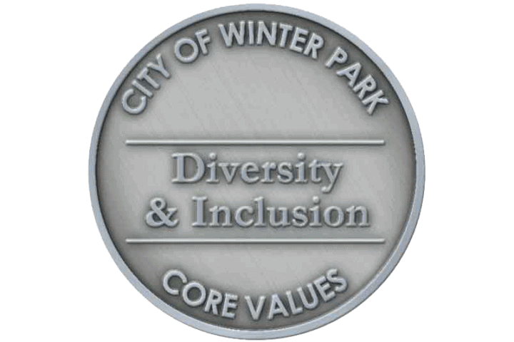 A coin representing the core value of Diversity & Inclusion