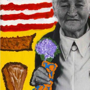 a face of an older man with the United State of America flag painted behind him. In his had is a painted carrot.