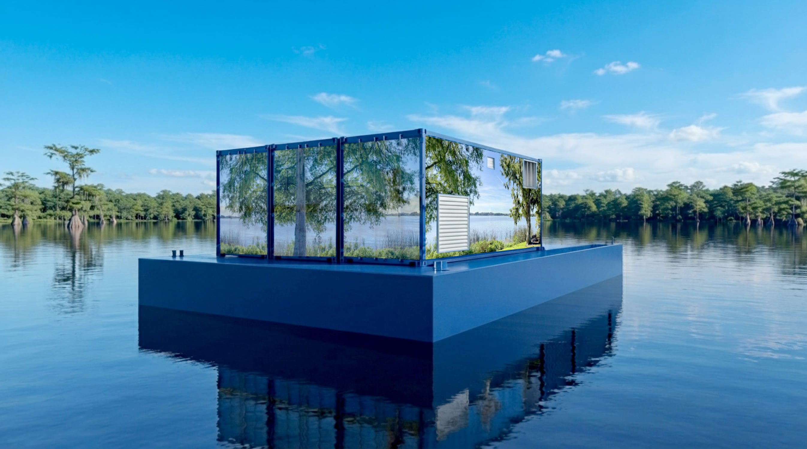 A large mirror on a pilot project platform reflects trees and water, blending with the lakeside scenery under a clear sky.
