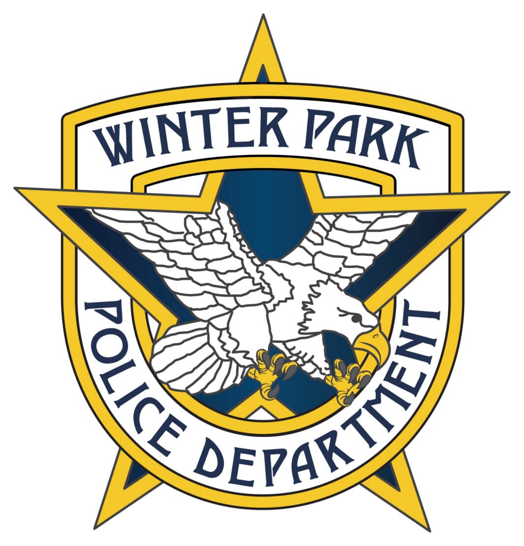 Winter Park Police Department badge featuring a gold-bordered star, an eagle with outstretched wings in the center, and the words Winter Park Police Department around the eagle. Ask about volunteer opportunities to serve your community.